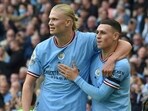 Erling Haaland (L) with Phil Foden(AP)