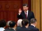 Chinese Film 'Return to Dust' Disappears: Chinese President Xi Jinping waves as he arrives for a reception in Beijing, China.