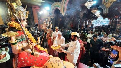 Thane, India - September 30, 2022: Chief Minister of Maharashtra Eknath Shinde along with his family worship Goddess Durga at Tembhi Naka Navratri pandal, in Thane, Mumbai, India, on Friday, September 30, 2022. (Praful Gangurde/HT Photo) (HT PHOTO) Thane, India - September 30, 2022: Chief Minister of Maharashtra Eknath Shinde along with his family worship Goddess Durga at Tembhi Naka Navratri pandal, in Thane, Mumbai, India, on Friday, September 30, 2022. (Praful Gangurde/HT Photo) (HT PHOTO)