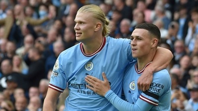 Erling Haaland (L) with Phil Foden (AP) Erling Haaland (L) with Phil Foden (AP)