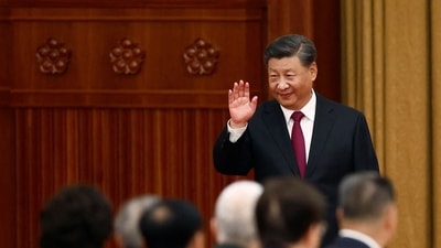 Chinese Film 'Return to Dust' Disappears: Chinese President Xi Jinping waves as he arrives for a reception in Beijing, China. (Reuters)