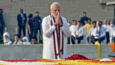  Prime Minister Narendra Modi pays homage at the Gandhi samadhi on the occasion of Mahatma Gandhi’s birth anniversary, at Rajghat, in New Delhi. (Hindustan Times) Prime Minister Narendra Modi pays homage at the Gandhi samadhi on the occasion of Mahatma Gandhi’s birth anniversary, at Rajghat, in New Delhi. (Hindustan Times)