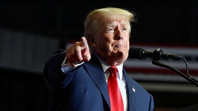 Former US president Donald Trump speaks during a rally. (Reuters)