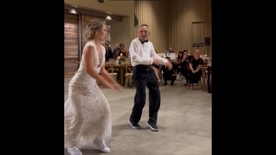Father-daughter duo's dance performance to songs from early 2000s on wedding day amazes netizens. Watch | Trending Father-daughter duo's dance performance to songs from early 2000s on wedding day amazes netizens. Watch | Trending