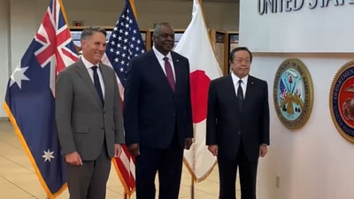 The defense ministers of the United States, Australia and Japan.
