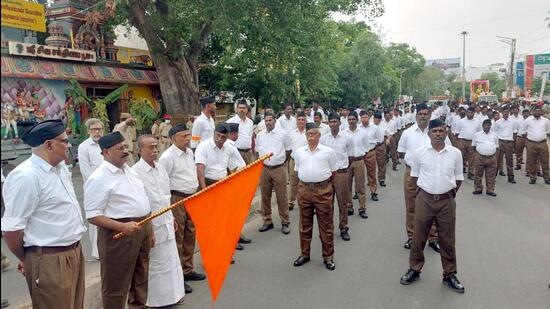 Scores of Rashtriya Swayamsevak Sangh (RSS) volunteers, both boys and men in uniform, marched on the streets of Puducherry. (ANI)