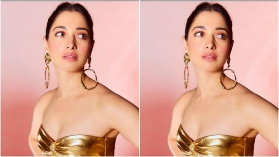 Tamannaah’s off-shoulder gown featured corset details in gold, while the rest of the gown featured metallic details in silver.(Instagram/@tamannaahspeaks)