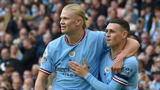 Erling Haaland (L) with Phil Foden (AP)