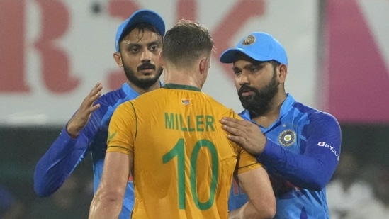 Rohit Sharma congratulates David Miller on scoring a century during the second T20I against India in Guwahati(AP)