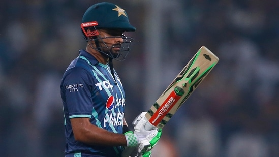 Pakistan's Babar Azam reacts as he walks off the field after losing his wicket during the fifth twenty20 cricket match vs England, in Lahore.(AP)