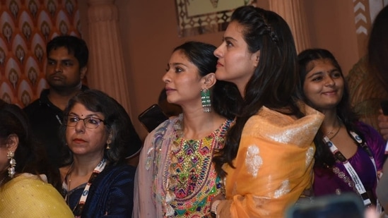 Kajol and Tanishaa Mukerji look at the Durga Puja idol as they join family and friends at a pandal in Juhu. Their mother Tanuja Mukerji also accompanies them to Durga Puja pandals every year but wasn't spotted on Saturday. (Varinder Chawla)