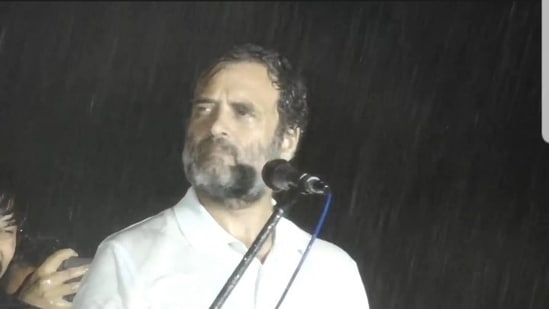 Congress MP Rahul Gandhi continued to address a large gathering amid heavy rain in Mysuru on Sunday.