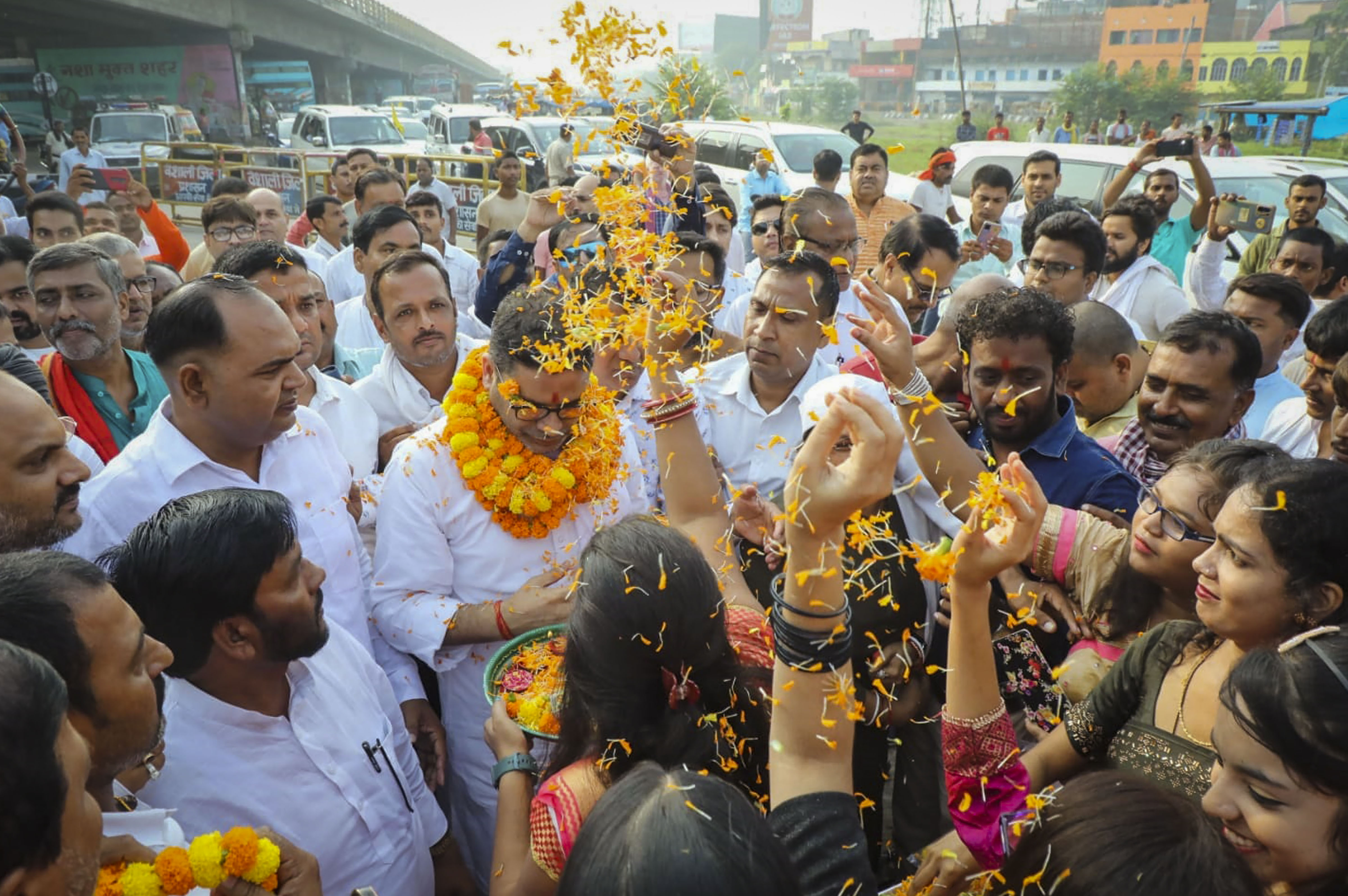 Political strategist and Jan Suraj Abhiyan chief Prashant Kishor being greeted by supporters before his 'Padyatra' at Hajipur in Vaishali. (PTI) Political strategist and Jan Suraj Abhiyan chief Prashant Kishor being greeted by supporters before his 'Padyatra' at Hajipur in Vaishali. (PTI)