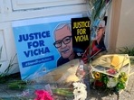 Vicha Ratanapakdee Death: &nbsp;Flowers are left with pictures of 84-year-old Vicha Ratanapakdee during a rally attended by hundreds of people in San Francisco.