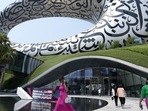 Visitors leave the Future Museum which is the venue for The Dubai Metaverse Assembly, in Dubai, United Arab Emirates, Wednesday, Sept. 28, 2022. (AP Photo/Kamran Jebreili) Visitors leave the Future Museum which is the venue for The Dubai Metaverse Assembly, in Dubai, United Arab Emirates, Wednesday, Sept. 28, 2022. (AP Photo/Kamran Jebreili)