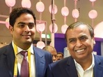 Reliance Industries Ltd Chairman Mukesh Ambani with his son and Reliance Jio chairman Akash Ambani during the 6th India Mobile Congress at Pragati Maidan in New Delhi, Reliance Industries Ltd Chairman Mukesh Ambani with his son and Reliance Jio chairman Akash Ambani during the 6th India Mobile Congress at Pragati Maidan in New Delhi,