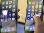 A customer holds an iPhone 6 (right) and iPhone 6 Plus after the phones went on sale at the Fifth Avenue Apple store in Manhattan in 2014. (REUTERS) A customer holds an iPhone 6 (right) and iPhone 6 Plus after the phones went on sale at the Fifth Avenue Apple store in Manhattan in 2014. (REUTERS)
