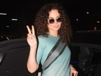 Kangana Ranaut was spotted at the Mumbai airport late Sunday night. She impressed her fans with her look in a simple saree and heels. During the day, she took part in the auction of PM Narendra Modi's gifts that were presented to him at special occasions. She bid for Ram Janam Bhumi soil and Ram Mandir design at the event. (Varinder Chawla)