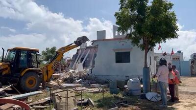 Among the 35 structures brought down over the last three days, 10 are mazars and shrines. Structures linked to Ramzan Gani Palani have also been demolished (Videograb) Among the 35 structures brought down over the last three days, 10 are mazars and shrines. Structures linked to Ramzan Gani Palani have also been demolished (Videograb)