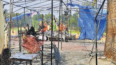 In a small corner of Uttar Pradesh’s Bhadohi district, Durga Puja has brought gloom and despair (PTI) In a small corner of Uttar Pradesh’s Bhadohi district, Durga Puja has brought gloom and despair (PTI)