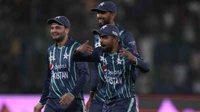 Pakistan's captain Babar Azam, right, and teammates celebrate the dismissal of England's Dawid Malan (AP) Pakistan's captain Babar Azam, right, and teammates celebrate the dismissal of England's Dawid Malan (AP)