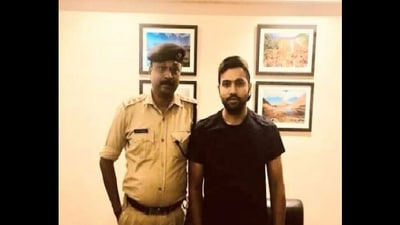 Rohit Sharma with Assam police officer (Twitter/@ponjitdowarah) Rohit Sharma with Assam police officer (Twitter/@ponjitdowarah)