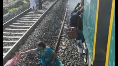 Women immediately alighted the coach when the fire broke out on Monday. (HT PHOTO)