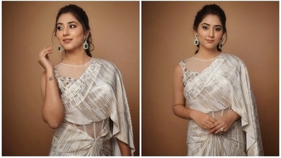 Disha Parmar poses in an embellished saree gown for a photoshoot. (Instagram) Disha Parmar poses in an embellished saree gown for a photoshoot. (Instagram)