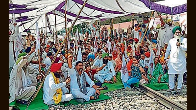 Farmers raise slogans as they block railway tracks during a protest on the first anniversary of the Lakhimpur Kheri case, at Lohian Khas Junction, in Jalandhar on Monday (ANI)