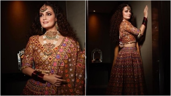 Dia Mirza in a red bandhani printed lehenga set by Anita Dongre!