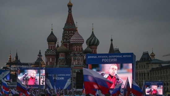 Russia-Ukraine War: Russian actor Ivan Okhlobystin is seen on big screens with words reading ''Donetsk, Luhansk, Zaporizhzhia, Kherson, Russia'' and "With Russia forever!".(AP)