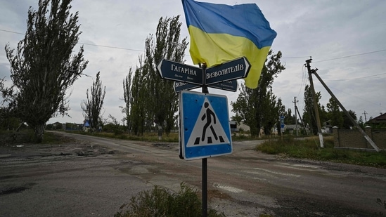 Russia-Ukraine War: Ukrainian flag waves on a street of the recently liberated village of Vysokopillya, Kherson region.(AFP)