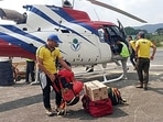 SDRF teams leave from Sahastradhara helipad in Dehradun to rescue mountaineering trainees trapped in an avalanche in Draupadi's Danda-2 mountain peak on Tuesday. (ANI Photo) SDRF teams leave from Sahastradhara helipad in Dehradun to rescue mountaineering trainees trapped in an avalanche in Draupadi's Danda-2 mountain peak on Tuesday. (ANI Photo)