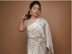 Disha Parmar is having the perfect wardrobe for Navratri this year. Be it a white saree with minimal decorations or a unique saree gown to sizzle in the evening Navratri parties, the actor is owning the fashion game like a pro. Disha, a day back, shared fresh fashion inspo with us in the form of a slew of pictures.(Instagram/@dishaparmar)