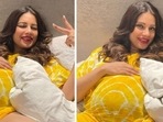 Bipasha Basu in a yellow outfit showing her baby bump.&nbsp;