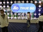 Visitors at the Reliance Jio Infocomm Ltd. booth at India Mobile Congress 2022 exhibition in New Delhi.(Bloomberg) Visitors at the Reliance Jio Infocomm Ltd. booth at India Mobile Congress 2022 exhibition in New Delhi.(Bloomberg)