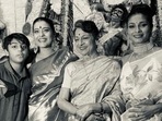 Kajol poses with son Yug, mother Tanuja and sister Tanisha Mukerji during Durga Puja celebrations. Kajol poses with son Yug, mother Tanuja and sister Tanisha Mukerji during Durga Puja celebrations.