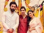 Mouni Roy poses with Ranbir Kapoor and Ayan Mukerji during Durga Pujo celebrations. (Instagram) Mouni Roy poses with Ranbir Kapoor and Ayan Mukerji during Durga Pujo celebrations. (Instagram)