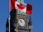 Canada Start-Up Visa: A Canada flag flies in front of the Peace Tower on Parliament Hill in Ottawa, Ontario. Canada Start-Up Visa: A Canada flag flies in front of the Peace Tower on Parliament Hill in Ottawa, Ontario.