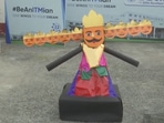 One of the students can be seen setting the few feet tall ‘Ravana’ effigy on fire within seconds at the click of a button.