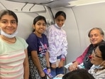 Tharoor shared a picture with "some young passengers" who walked up to him with autograph books. (source:Twitter/@ShashiTharoor)