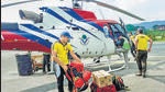 SDRF team members leave from Sahastradhara helipad to rescue the trainees trapped in an avalanche in Draupadi's Danda-2 mountain peak in Dehradun on Tuesday. (PTI) SDRF team members leave from Sahastradhara helipad to rescue the trainees trapped in an avalanche in Draupadi's Danda-2 mountain peak in Dehradun on Tuesday. (PTI)