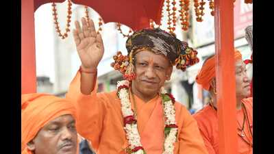 Yogi Adityanath, seated on a chariot, leading a procession in Gorakhpur (HT) Yogi Adityanath, seated on a chariot, leading a procession in Gorakhpur (HT)