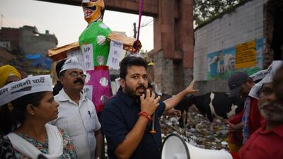 AAP MLA Durgesh Pathak at a protest against the failure of BJP-ruled erstwhile MCDs to clean the city. The AAP leaders on Tuesday burnt effigies of trash across the city. (Sanchit Khanna/HT Photo) AAP MLA Durgesh Pathak at a protest against the failure of BJP-ruled erstwhile MCDs to clean the city. The AAP leaders on Tuesday burnt effigies of trash across the city. (Sanchit Khanna/HT Photo)
