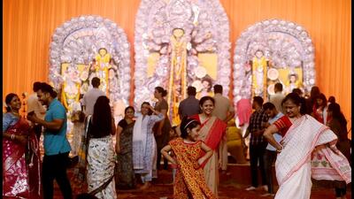 Devotees take part in celebrations during Durga Puja festival, at CR Park in New Delhi. (ANI) Devotees take part in celebrations during Durga Puja festival, at CR Park in New Delhi. (ANI)