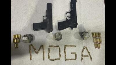 The grenades, pistols and ammunition recovered from a Khalistan Tiger Force (KTF) operative in Moga. (HT File)
