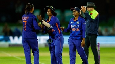 India's Harmanpreet Kaur and teammates celebrate winning the match (Reuters)