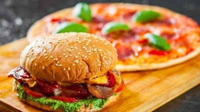 It is recommended to stay away from fried food items, pizza and burgers. (Unsplash)