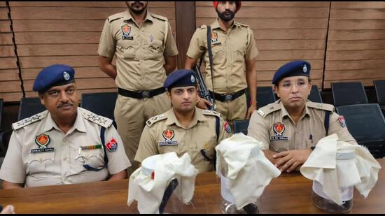 Mansa police recovered three weapons including a .450 bore revolver, .32 bore pistol and 9mm pistol, from the residence of Pritpal Singh, the cop dismissed on helping Tinu flee. (HT Photo)