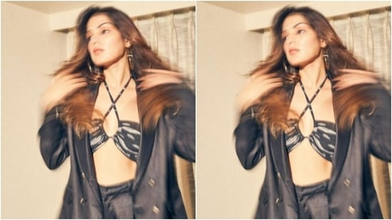 In stunning hair flips with open tresses in soft wavy curls and minimal makeup in nude eyeshadow, mascara-laden eyelashes, drawn eyebrows, contoured cheeks and a shade of nude lipstick, Rhea aced the look to perfection.(Instagram/@rhea_chakraborty)